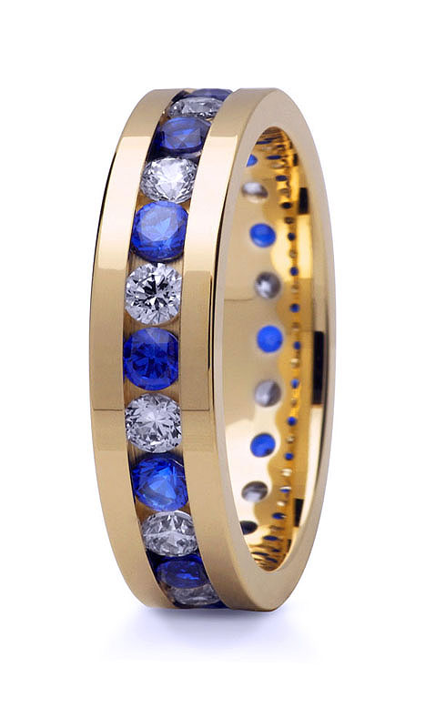 Obrączki z żółtego i białego złota z kamieniem 1